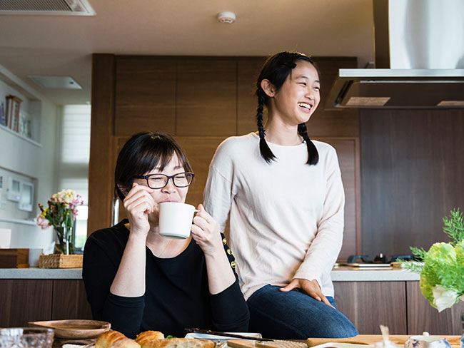 Mother and daughter at dining table