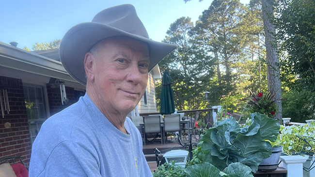 Kent Nicholson tends to his garden.
