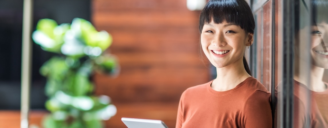 lady smiling with tablet