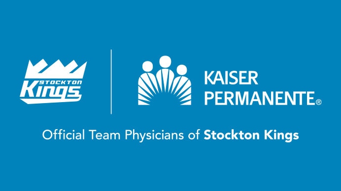 Logo of the Stockton Kings showing Kaiser Permanente provides the official team physicians