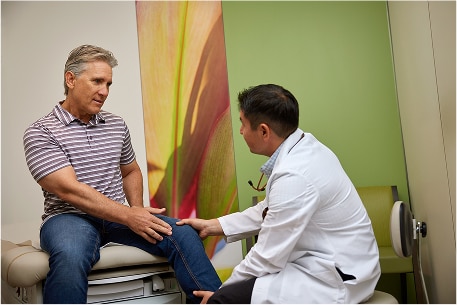 Doctor examing a patient