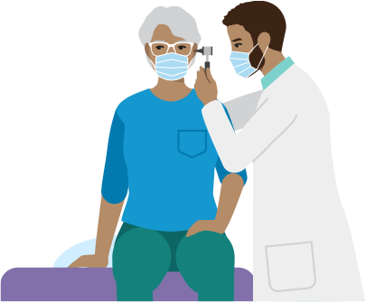 Médico examinando a un paciente.