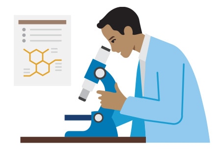 Investigador mirando a través de un microscopio
