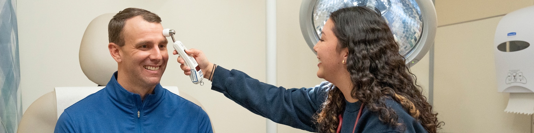 Nurse examining a patient