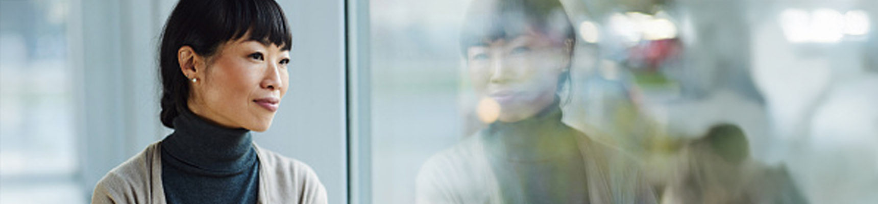 Person staring out of a window
