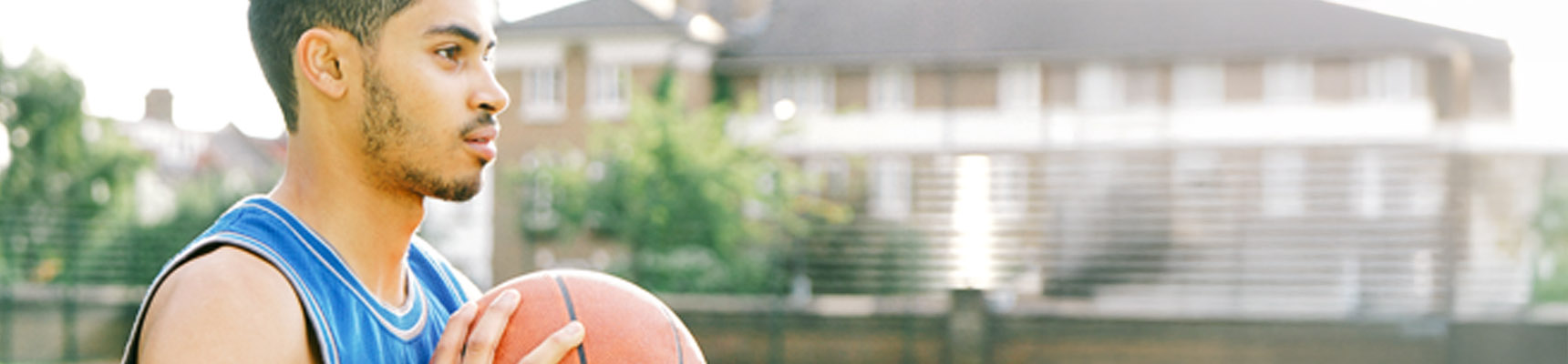 Person playing basketball.