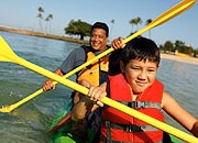 Father and son in kayak
