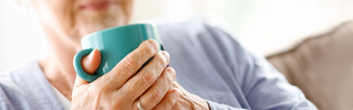 Woman holding a coffee mug