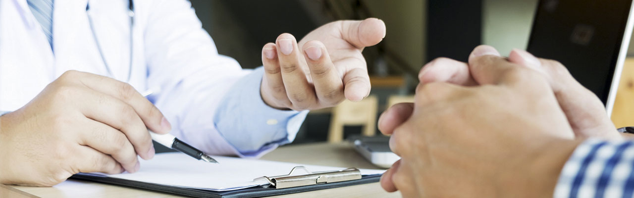 care provider and patient discuss medications