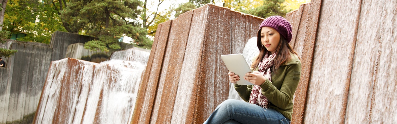 woman reading tablet