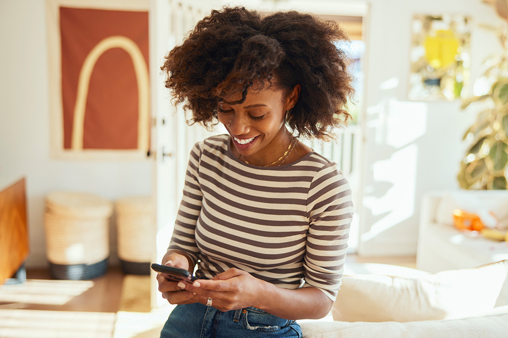 Person engaging with mobile phone