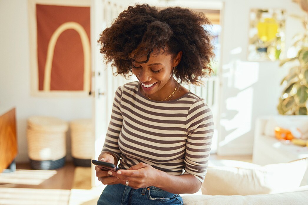 Person engaging with mobile phone