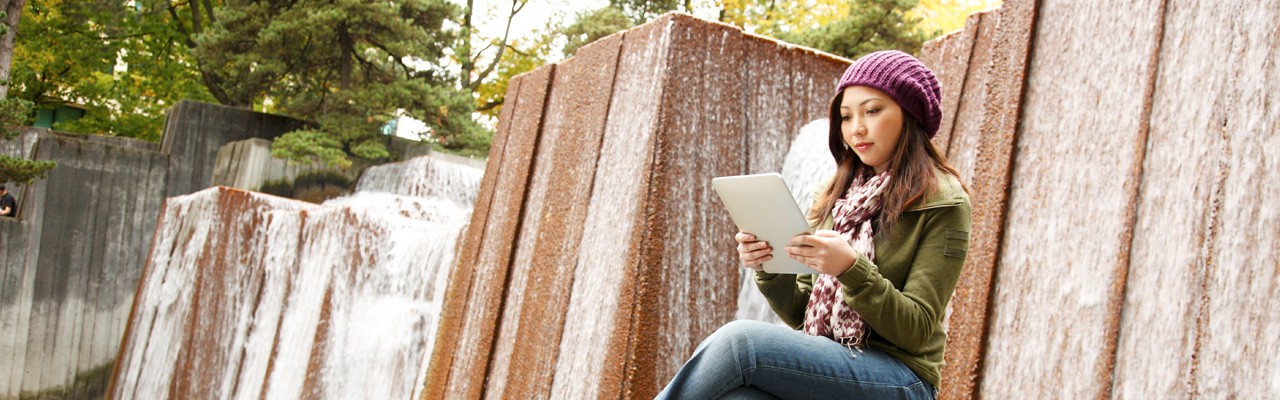 Woman reading tablet
