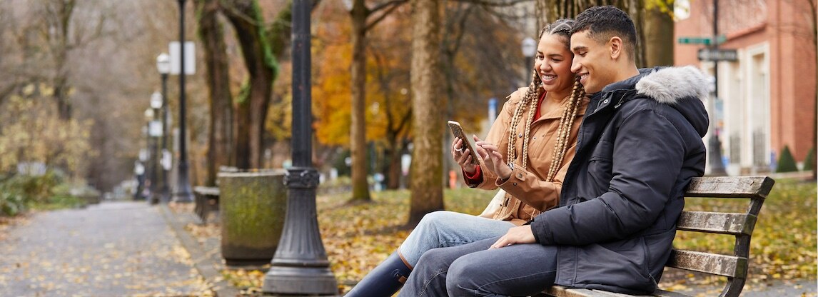 couple sitting on bench
